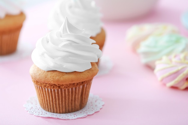 Delicious cupcake on table