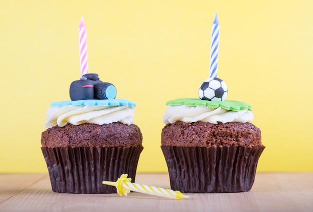 Delicious cupcakes on table