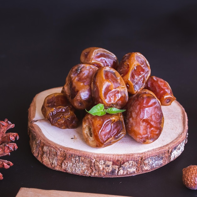 Delicious Date Fruit in a bowl. Bowl of dried dates.