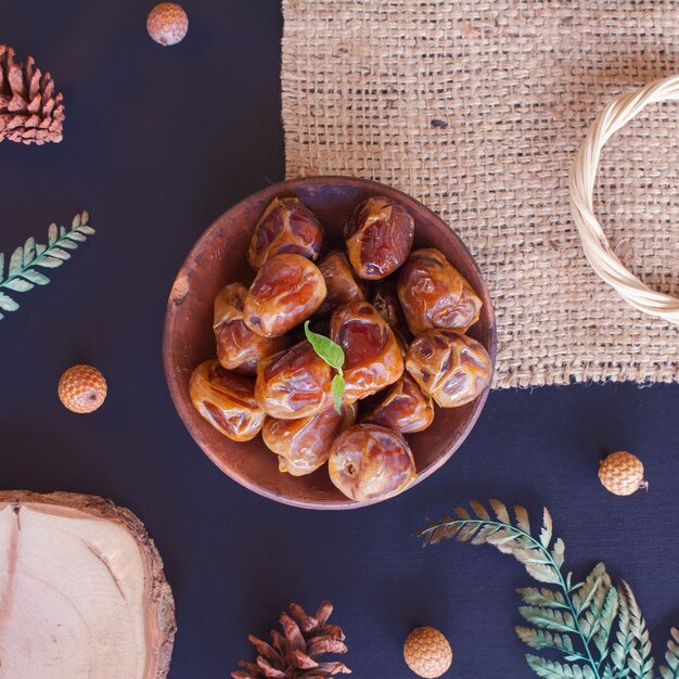 Delicious Date Fruit in a bowl. Bowl of dried dates.