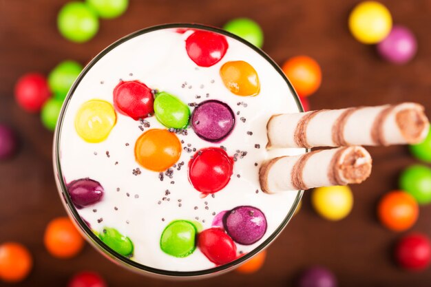 Delicious dessert with colorful candies