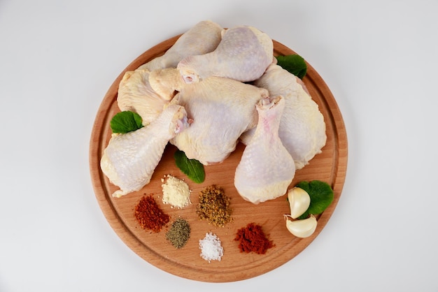 A delicious dish can be made with raw chicken drumsticks and spices