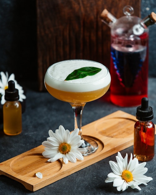 Delicious exotic cocktail with daisy