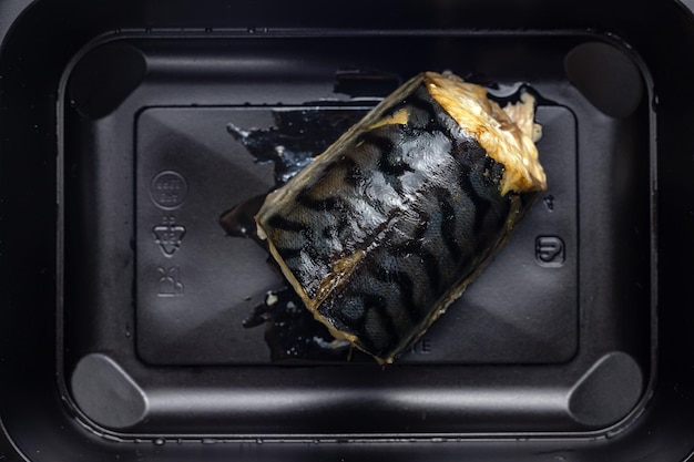 Delicious fish in a black box delivery