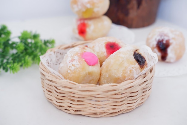 delicious flavor filled ball donuts as a background