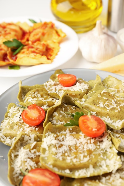 Delicious food concept with ravioli on white background