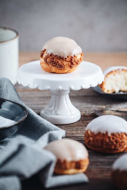 Delicious french Choux Craquelin pastries filled with cream