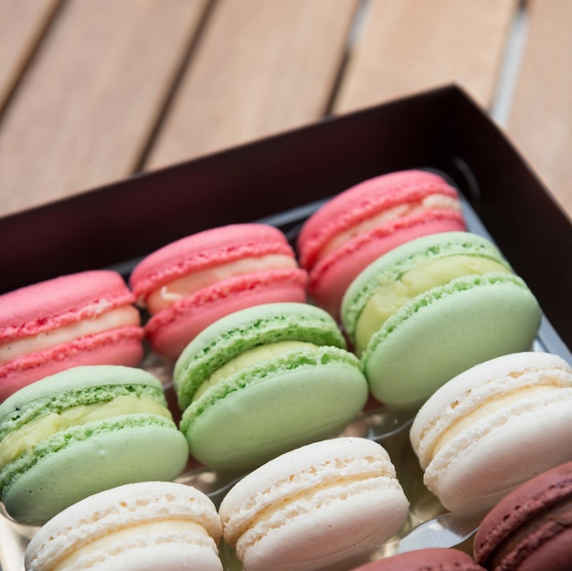 Delicious French macaroons on a gift box