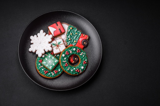 Delicious fresh colorful Christmas or New Year gingerbread cookies