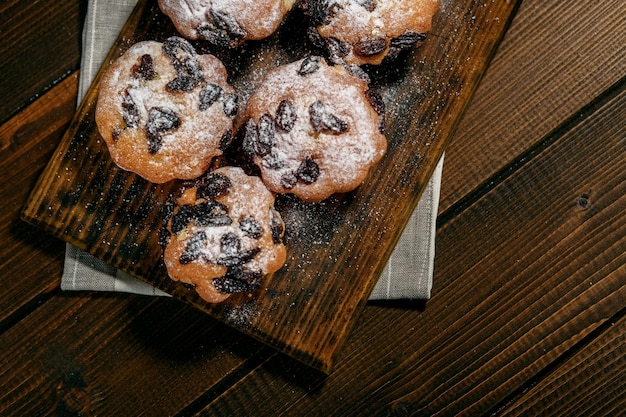 Delicious fresh cupcakes with raisins View from above The concept of food pastries desserts