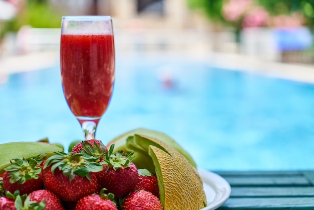 Delicious fresh fruits and pool