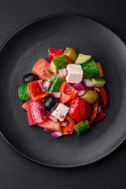 Delicious fresh Greek salad with feta cheese olives tomatoes and cucumbers