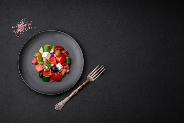 Delicious fresh Greek salad with feta cheese olives tomatoes and cucumbers