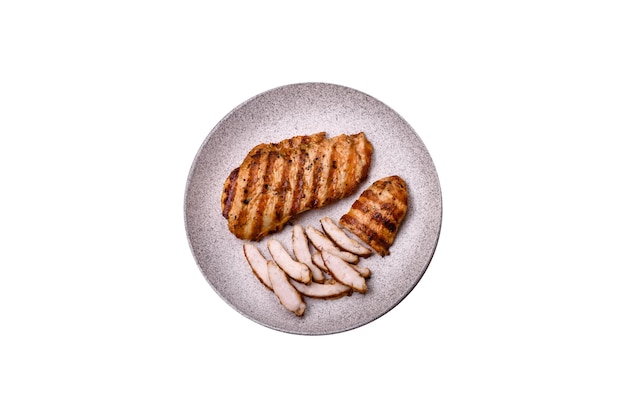 Delicious fresh grilled chicken fillet with spices and herbs