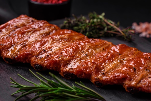 Delicious fresh grilled or smoked ribs with salt spices and herbs