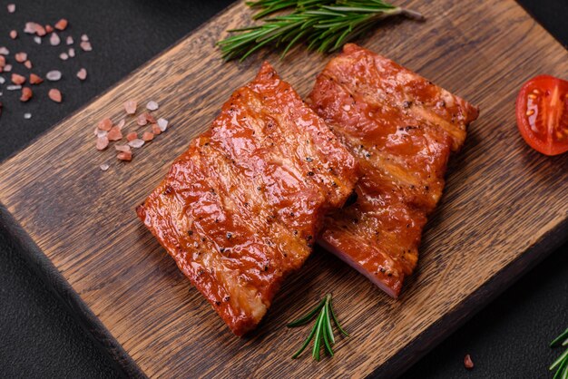 Delicious fresh grilled or smoked ribs with salt spices and herbs