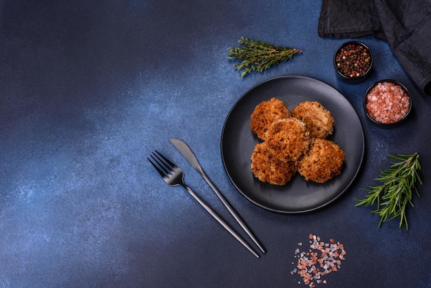 Delicious fresh ground beef patties with onions in breadcrumbs