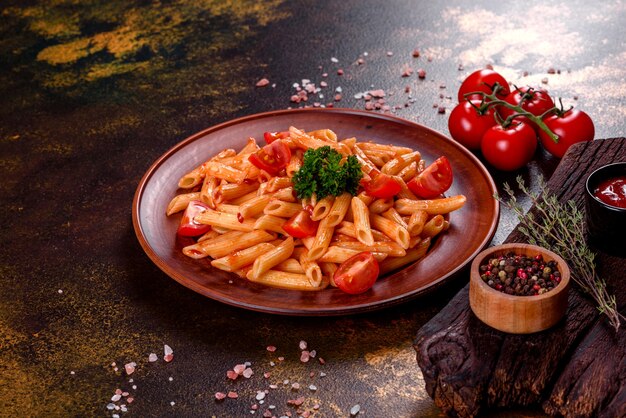 Delicious fresh paste with tomato sauce with spices and herbs  . Mediterranean cuisine