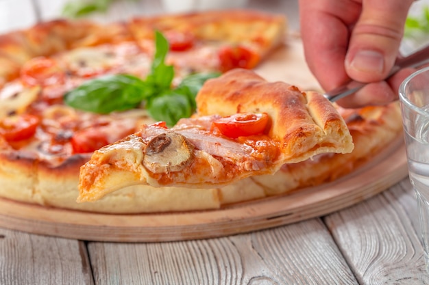 Delicious fresh pizza served on wooden table