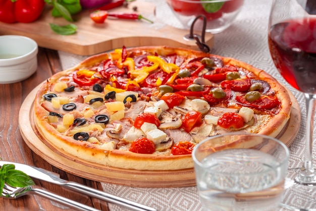 Delicious fresh pizza served on wooden table