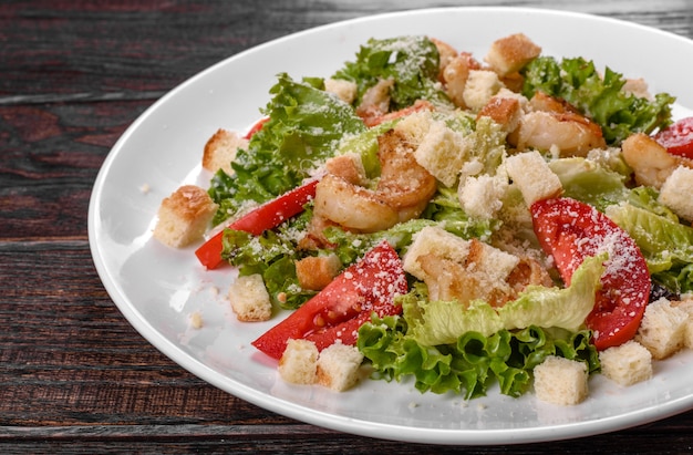 Delicious fresh salad with shrimp for the festive table