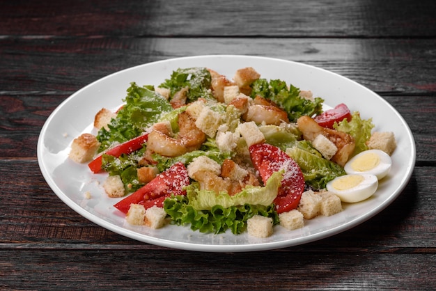 Delicious fresh salad with shrimp for the festive table