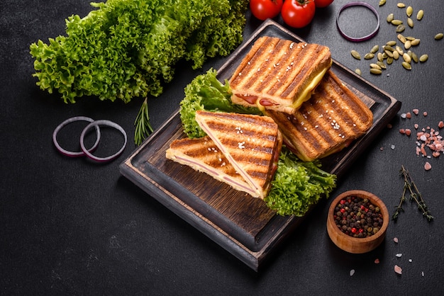 Delicious fresh toast grill with cheese and ham. Sandwiches, quick snack