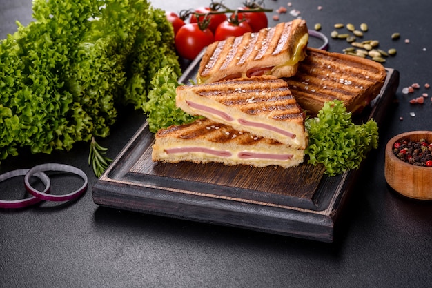 Delicious fresh toast grill with cheese and ham. Sandwiches, quick snack