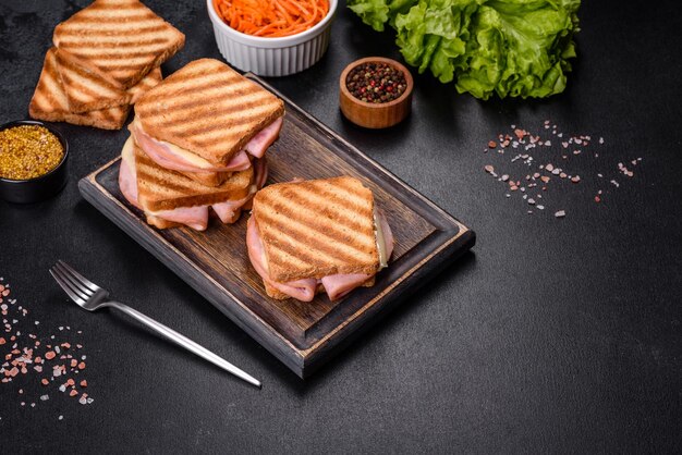 Delicious fresh toast grill with cheese and ham Sandwiches quick snack