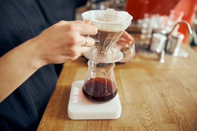 Delicious, freshly ground morning coffee powder in the coffee filter.