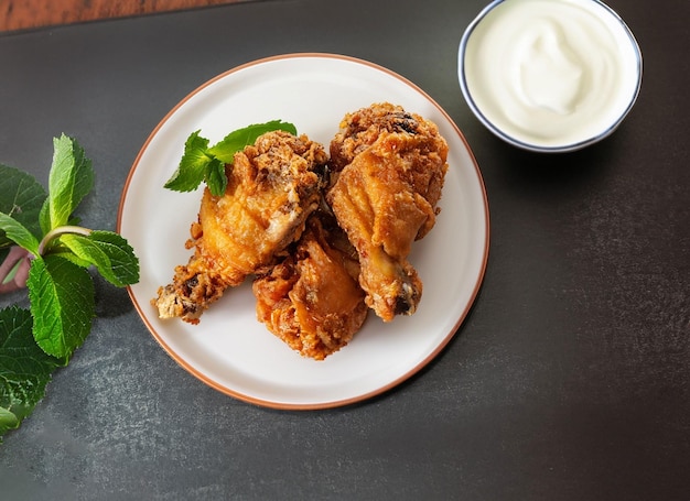 Photo delicious fried chicken on a plate