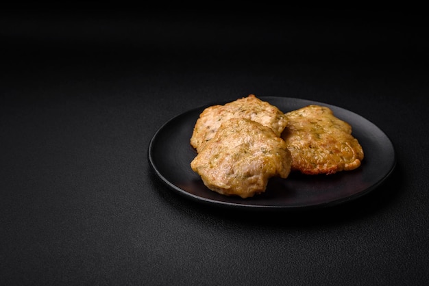 Delicious fried chopped fillet pancakes with spices salt and herbs