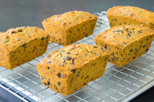 Delicious fruit cake with mixed fruit  on grate 