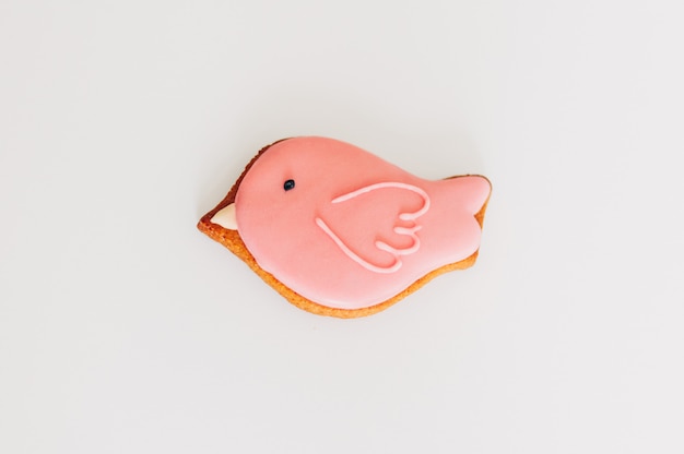 Delicious gingerbread in the form of a pink bird.