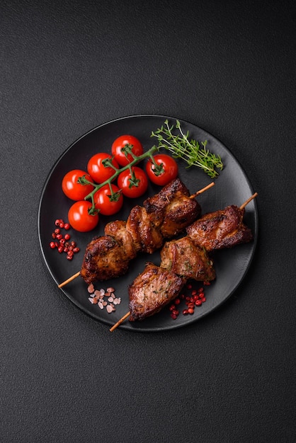 Delicious grilled chicken turkey or pork skewers with salt spices and herbs