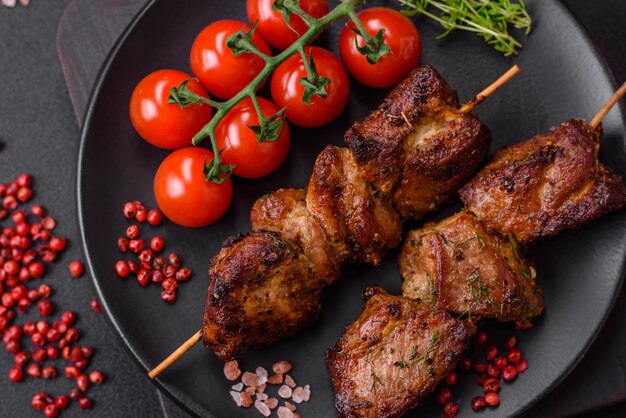 Delicious grilled chicken turkey or pork skewers with salt spices and herbs