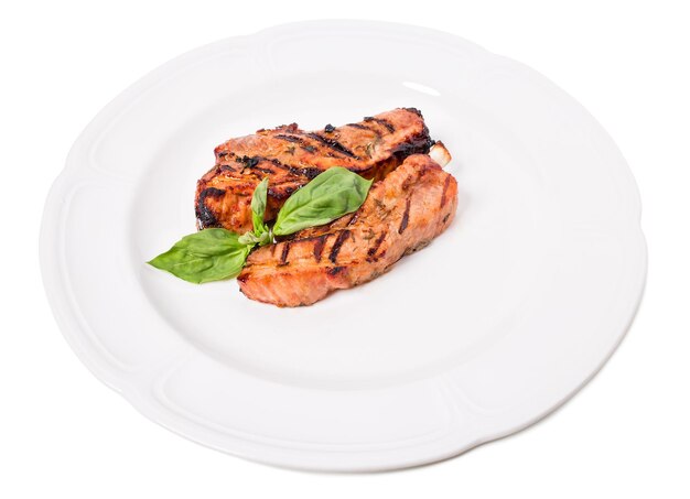 Delicious grilled pork shish kebab with basil