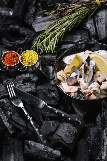 delicious grilled seafood in the restaurant. On a dark background