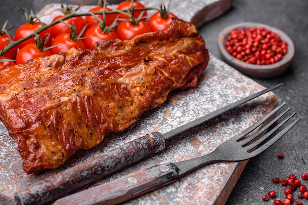 Delicious grilled or smoked pork ribs with salt spices and herbs