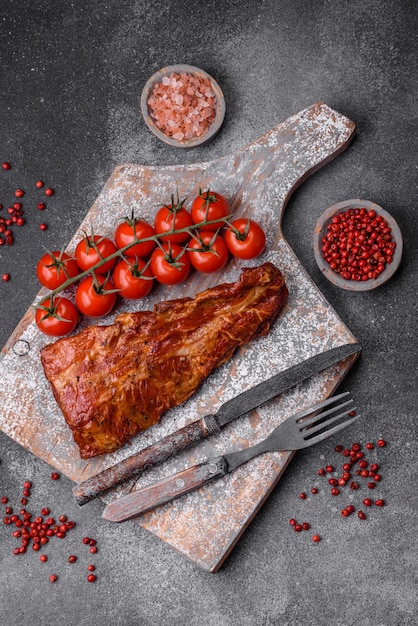 Delicious grilled or smoked pork ribs with salt spices and herbs