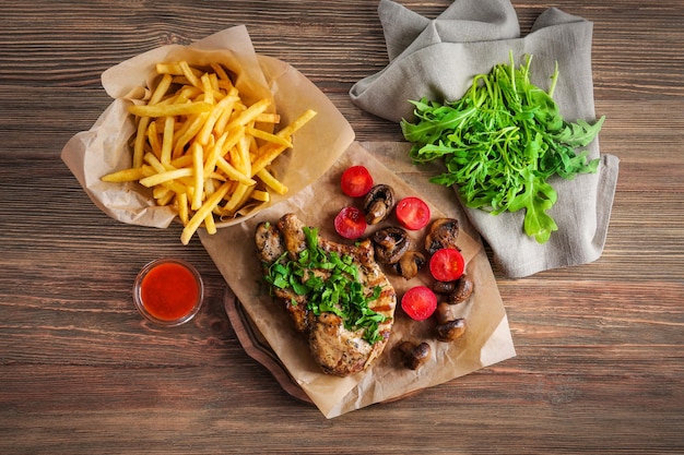 Delicious grilled steak frites on waxed paper