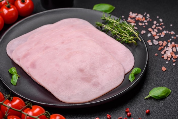 Delicious ham sliced with salt spices and herbs as ingredients for making sandwiches