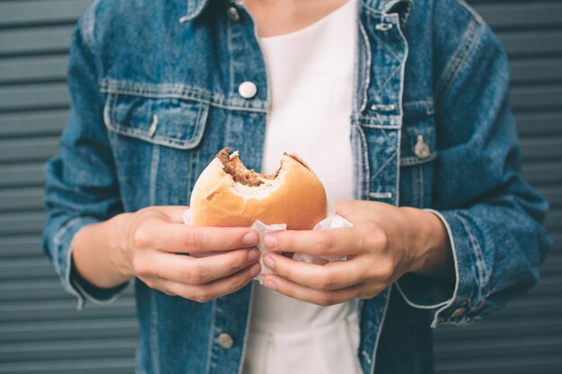 Delicious hamburger in the hands