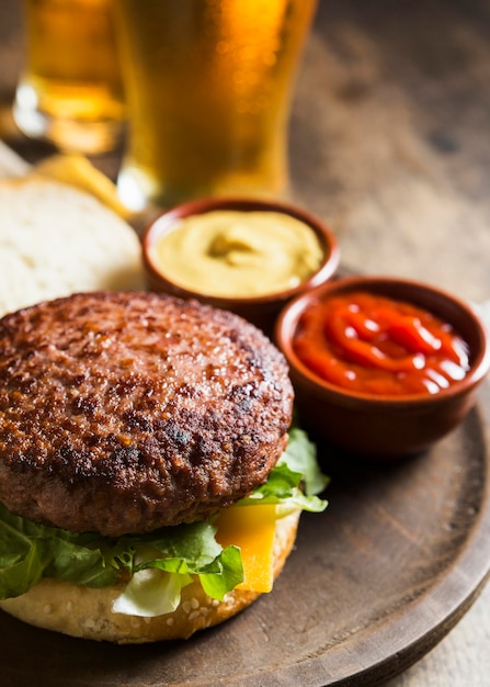 Delicious hamburger with glasses of beer