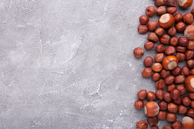 Delicious hazelnut on a grey concrete 