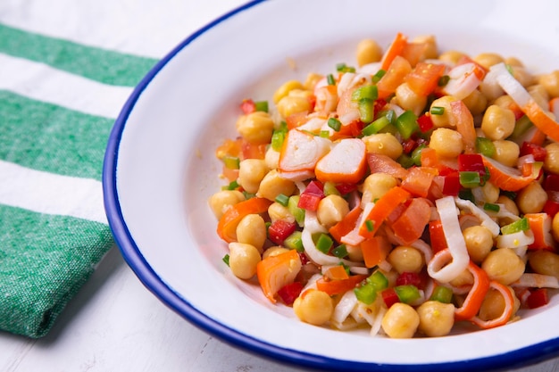 Delicious and healthy chickpea salad with crab surimi