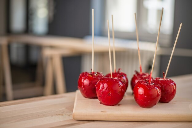 Delicious holiday apples on wooden board.