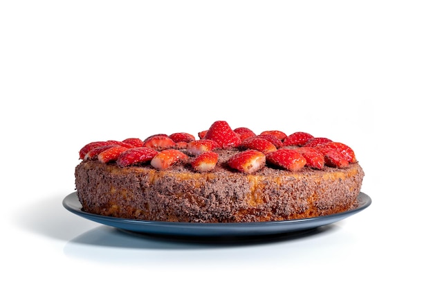 Delicious homemade cake with fresh strawberries isolated