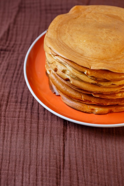 Delicious homemade fried pancakes with natural ingredients plate with homemade pancakes