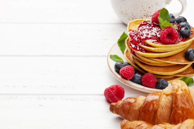 Delicious homemade pancakes with summer berries